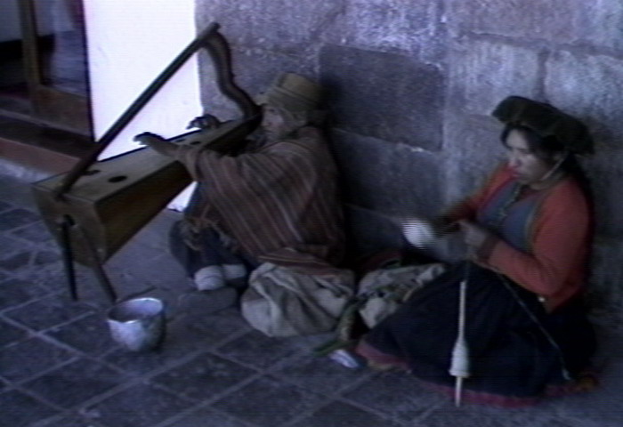 The blind harpist and his wife
